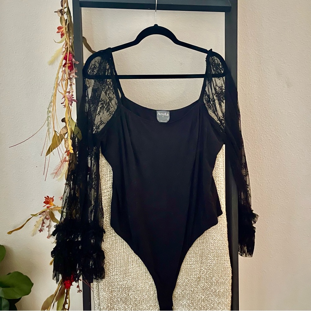 Brand new Arula body suit.